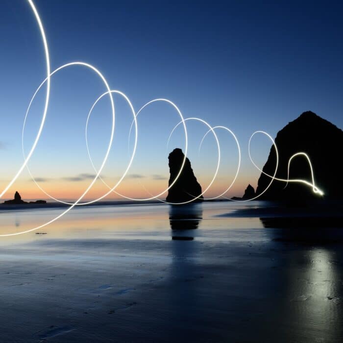 fireworks sparklers beach light circle sunset