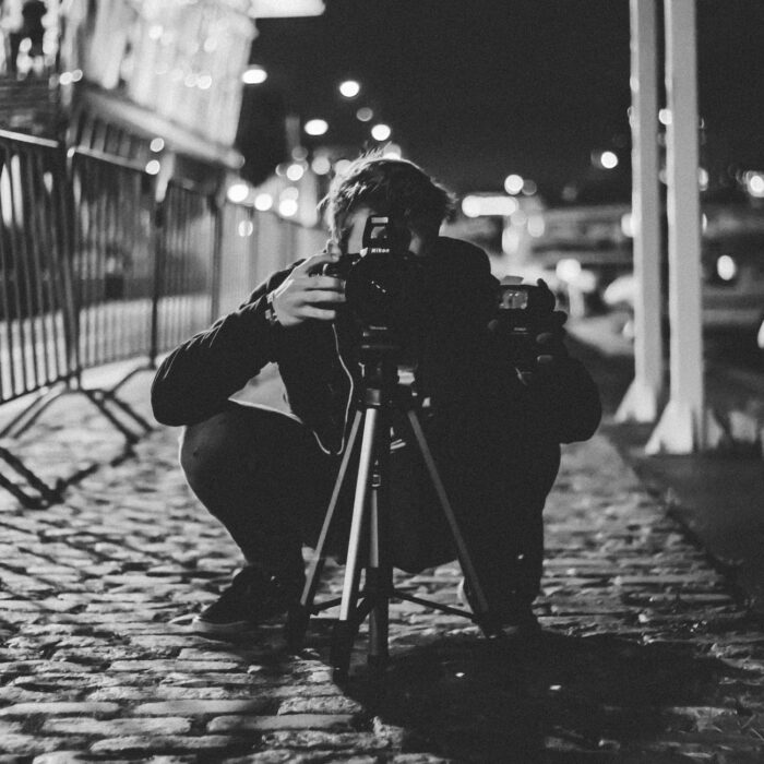 photographer in a dark night influencer camera