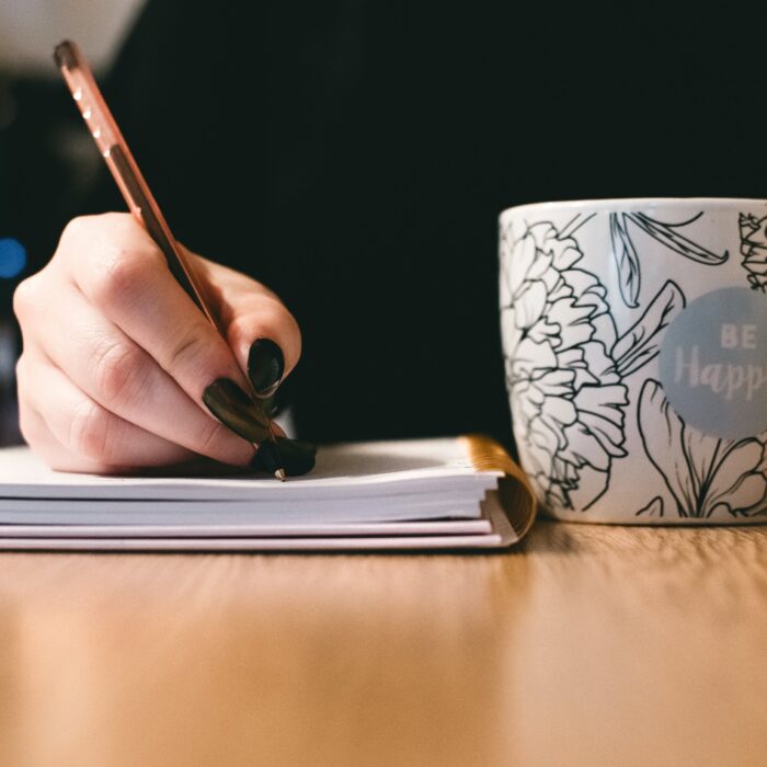 be happy cut woman writing in notebook