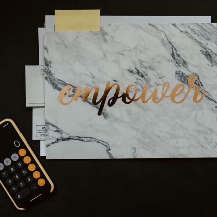 folder that says empower with a calculator