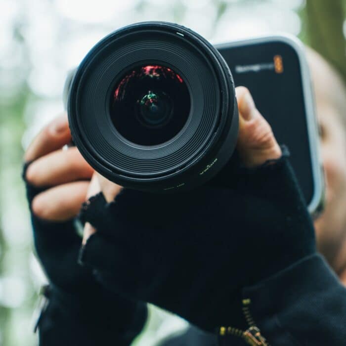 man holding a video camera