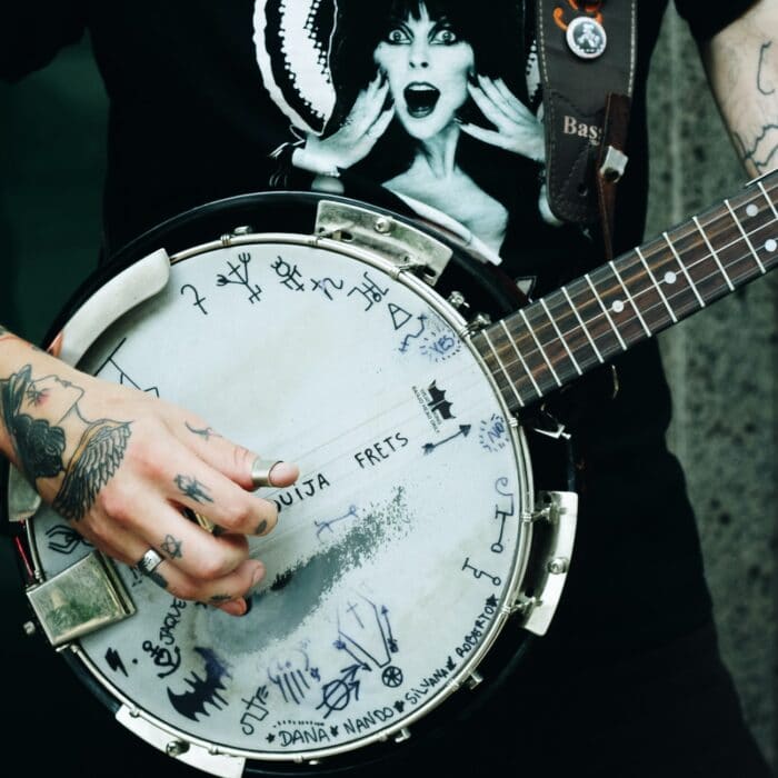 man playing banjo music instrument