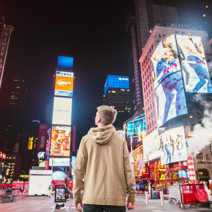 ads new york city boy looking at buildings