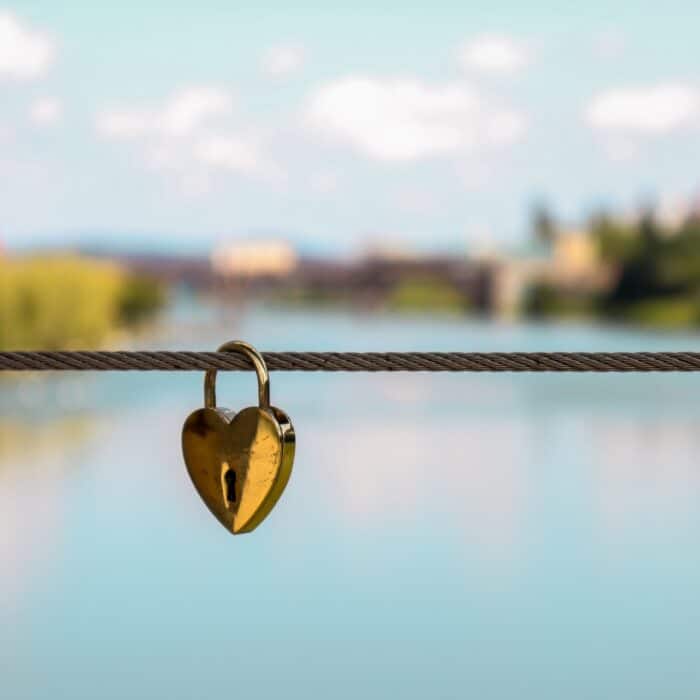 hear lock on a string on a bridge river