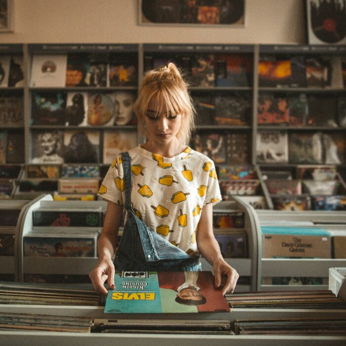 woman looking at music in the store