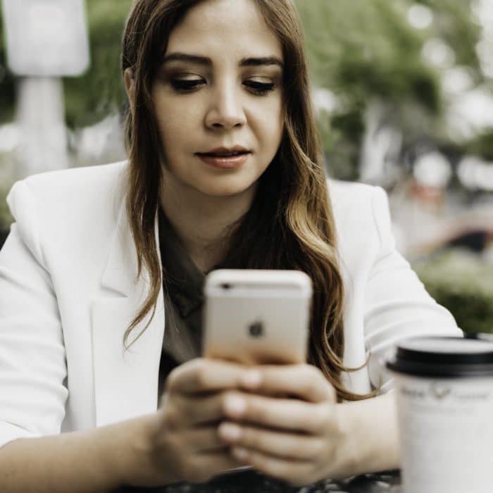 woman looking at phone