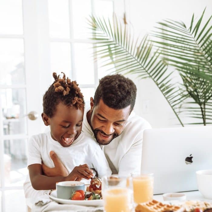 man and son with computer