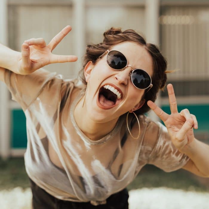 smiling woman with sunglasses