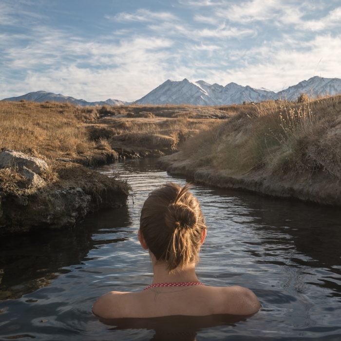 woman in creek turned away