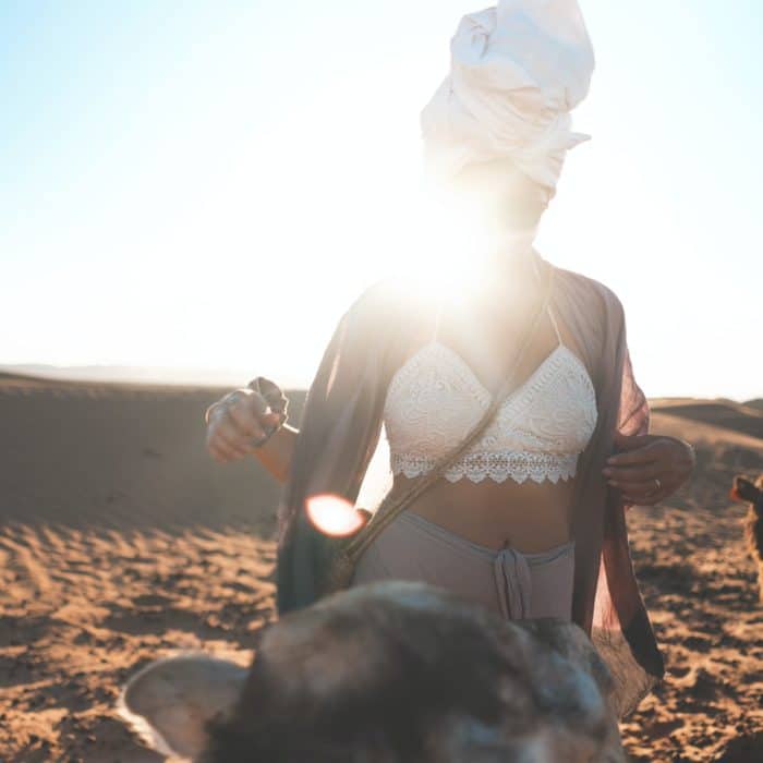 woman with camels