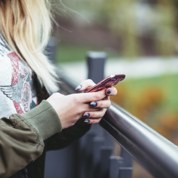 Woman Holding Phone