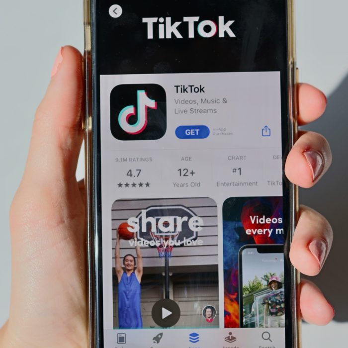 Holding TikTok Phone