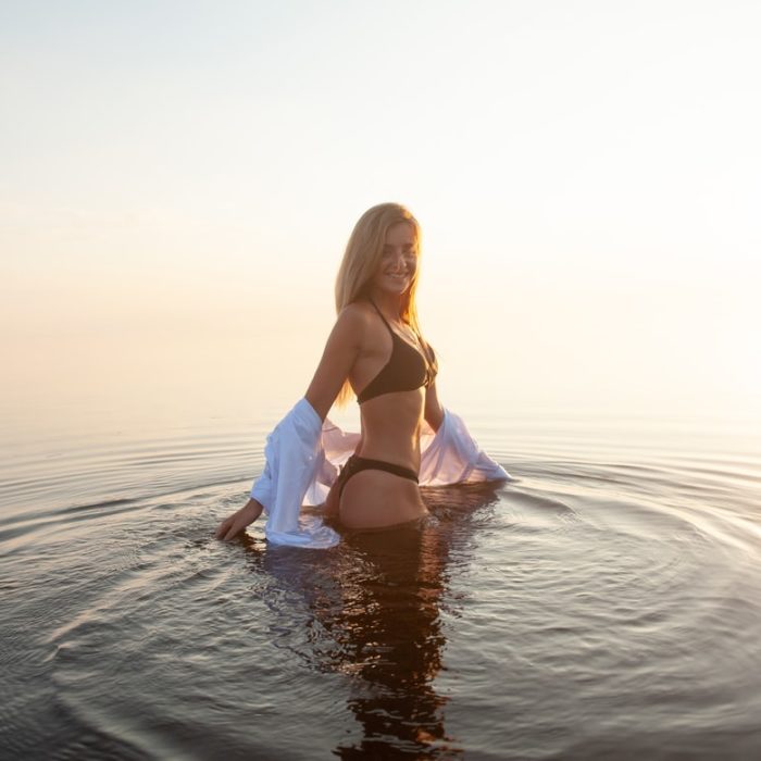 woman in water in bikini