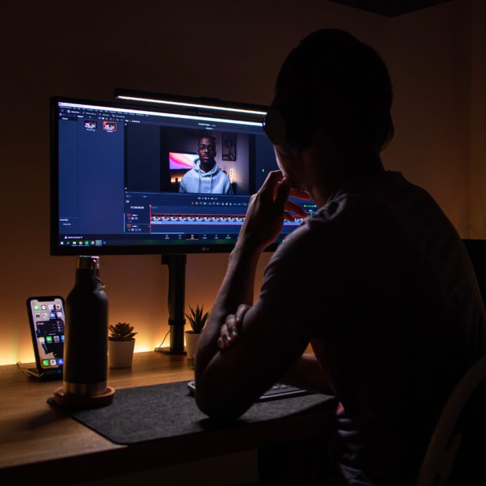 Man in a Dark Room Using Computer