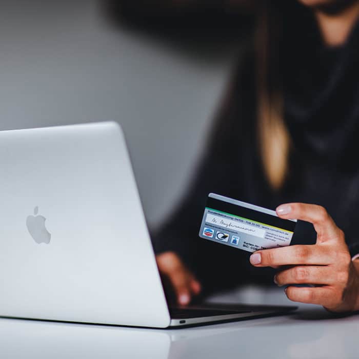 Woman Holding Credit Card