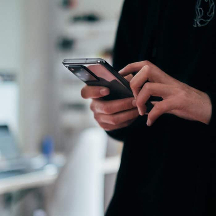 woman holding phone