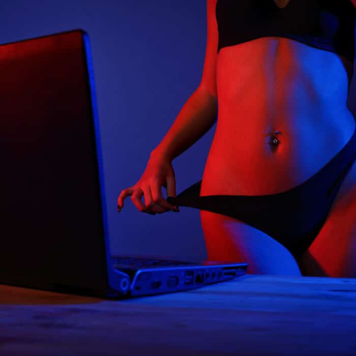 Woman in lingerie records a movie for web portal