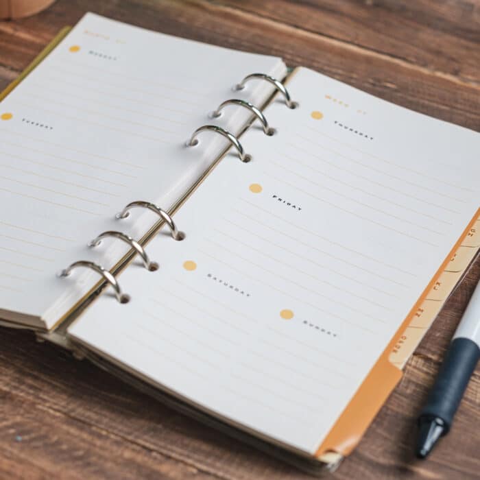 Close up planner book on wooden table