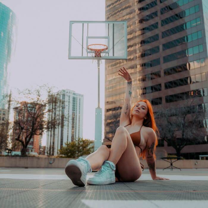 woman in bikini playing basketball